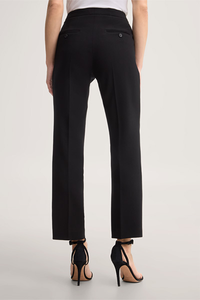 Leads to product detail page "Black wool crepe straight cut trousers"