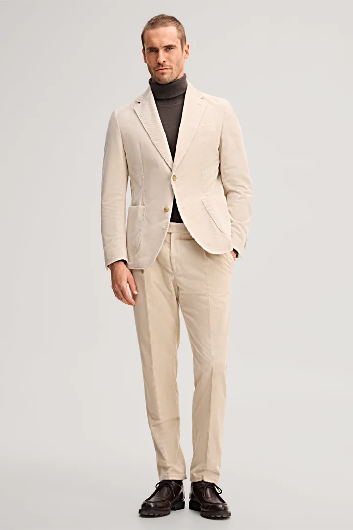 Mène à la page produit « Veste en velours côtelé beige »