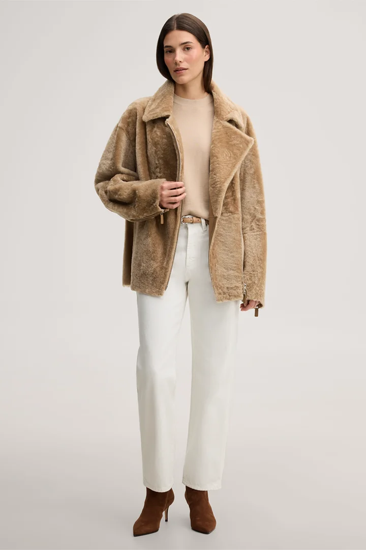 Leads to product detail page "Beige lambskin biker jacket with zip"