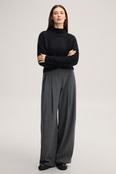 Leads to product detail page "Brushed cashmere jumper with a stand-up collar in black"