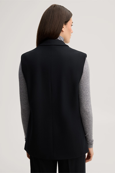 Leads to product detail page "Black flannel and wool jersey waistcoat"