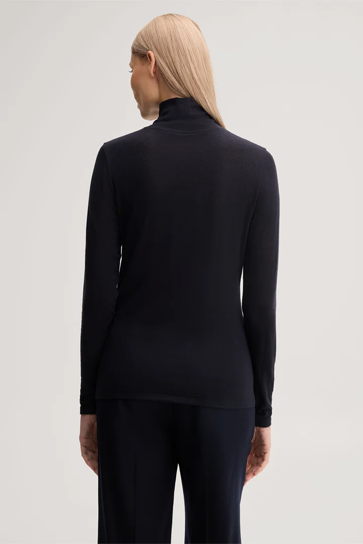 Leads to product detail page "Roll Neck Shirt in Stretch Wool in Navy"