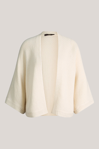 Leads to product detail page "Ecru cashmere cape"