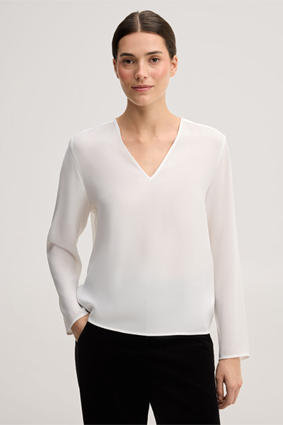 Leads to product detail page "Ecru crepe blouse-style shirt"