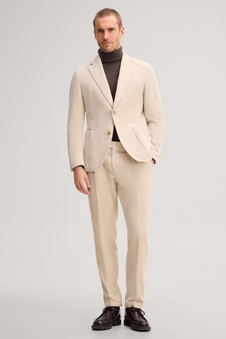 Mène à la page produit « Veste en velours côtelé beige »