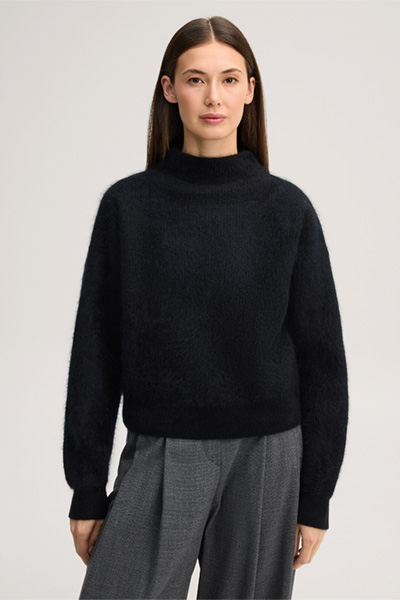 Leads to product detail page "Brushed cashmere jumper with a stand-up collar in black"