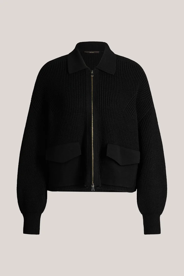 Leads to product detail page "Black merino knitted zip-up cardigan"