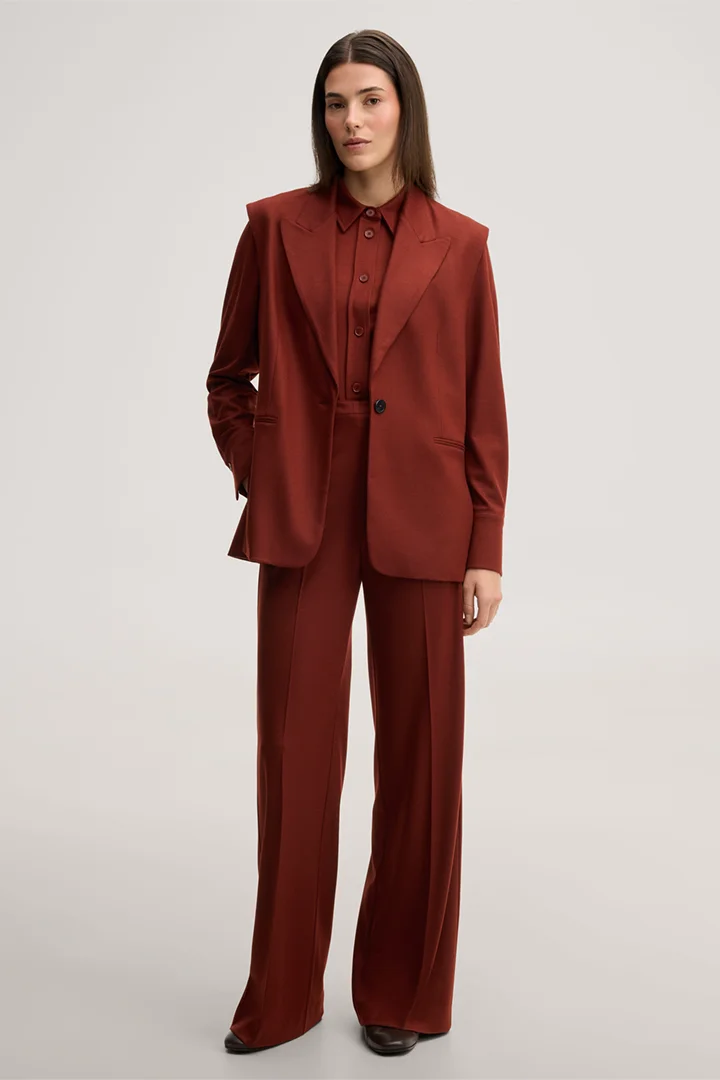 Leads to product detail page "Dark red flannel and wool jersey Marlene trousers"