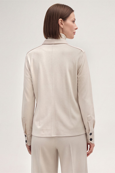 Leads to product detail page "Wool Jersey Shirt-style Blouse in Light Beige"