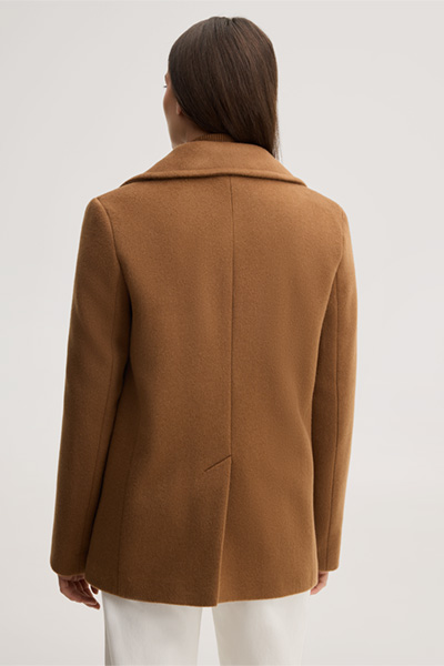 Leads to product detail page "Brushed wool pea coat in caramel"