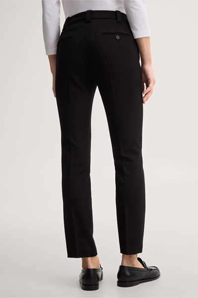 Leads to product detail page "Black crêpe cigarette pants"