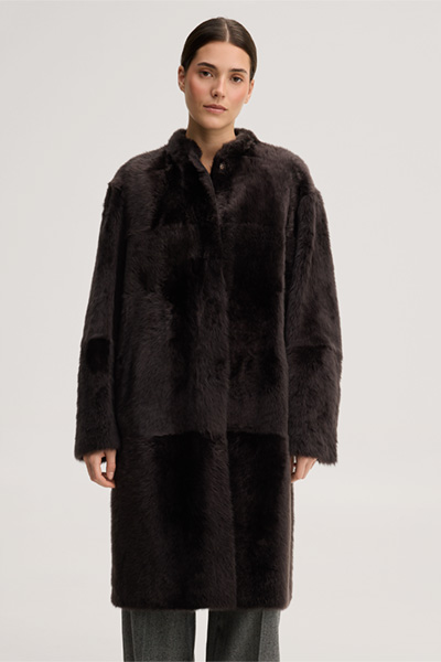 Leads to product detail page "Reversible lambskin coat in dark brown"