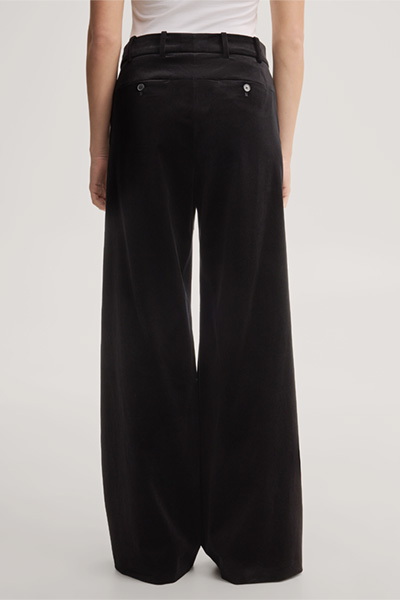 Leads to product detail page "Black velvet palazzo trousers"