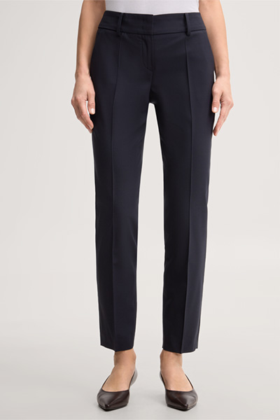 Leads to product detail page "Navy blue virgin wool stretch cigarette pants"