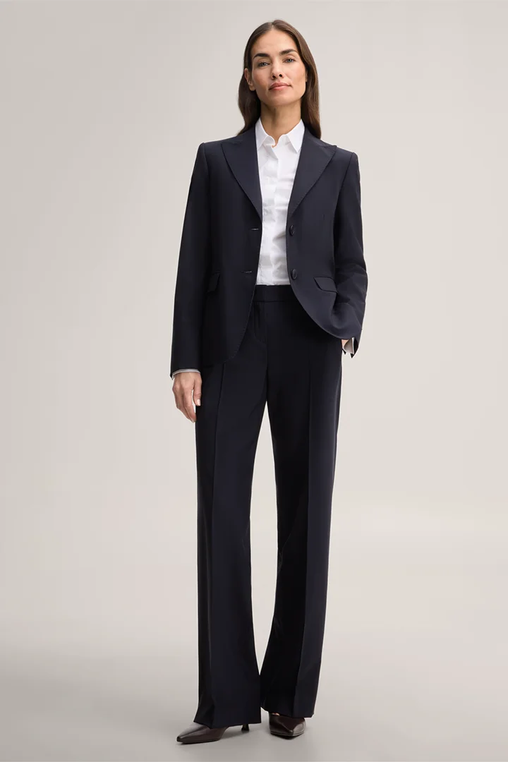 Leads to product detail page "Virgin Wool Stretch Blazer in Navy"