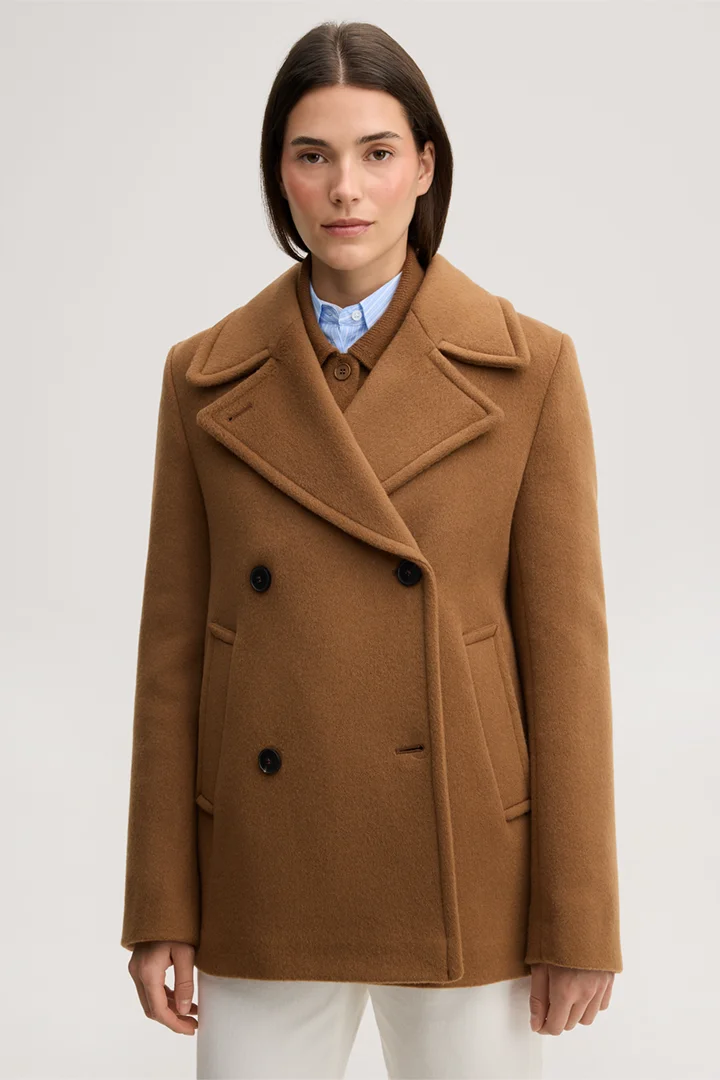 Leads to product detail page "Brushed wool pea coat in caramel"