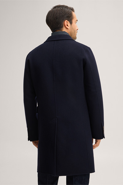 Leads to product detail page "Double-faced woollen coat with lapels in navy blue"