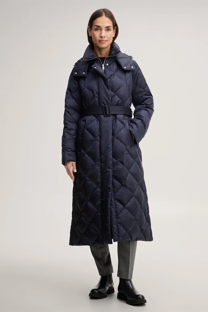 Leads to product detail page "Nylon down-filled quilted coat with stand-up collar in navy blue"