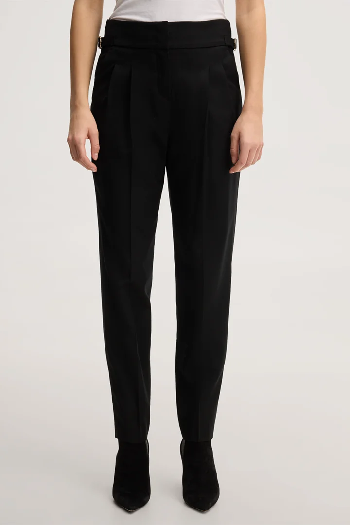 Leads to product detail page "Black virgin wool flannel pleated trousers"