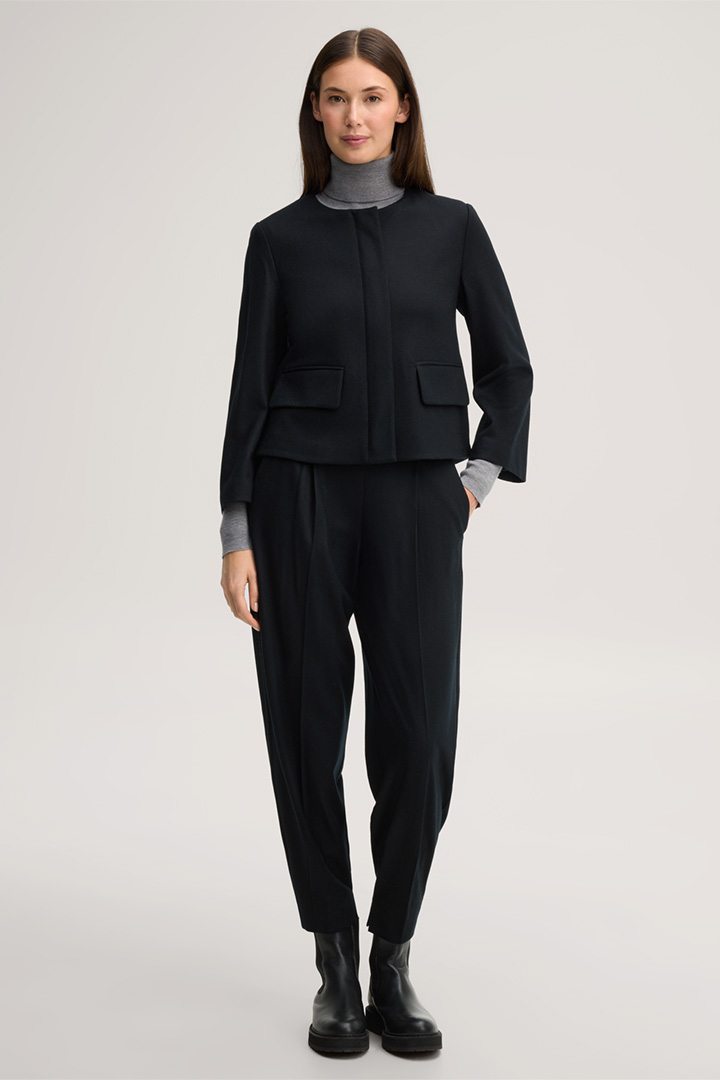 Leads to look detail page “<p><strong>Shop the Look:</strong><br> Flannel-Wool Jersey Pantsuit in Black</p>”