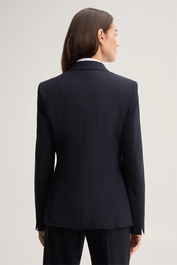 Leads to product detail page "Virgin Wool Stretch Blazer in Navy"