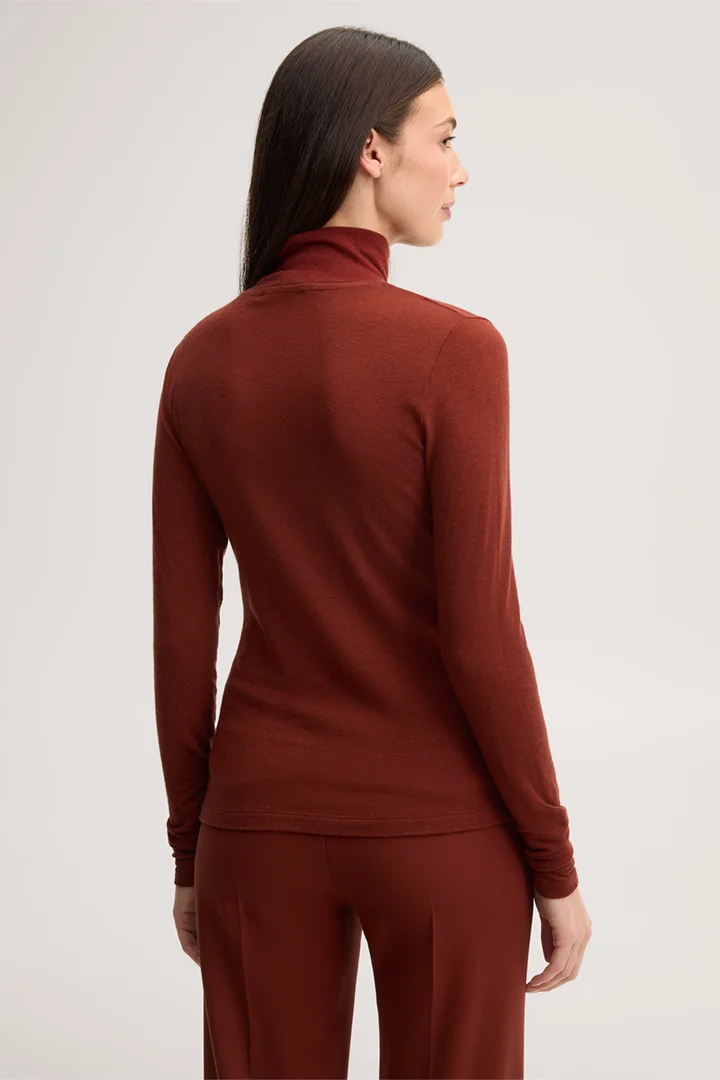 Führt zu Produktdetailseite „Wollstretch-Rollkragen-Shirt in Dunkelrot"