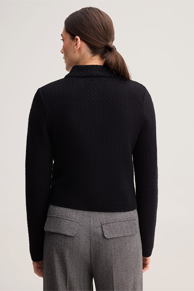 Leads to product detail page "Black fringed tweed knitted cardigan"