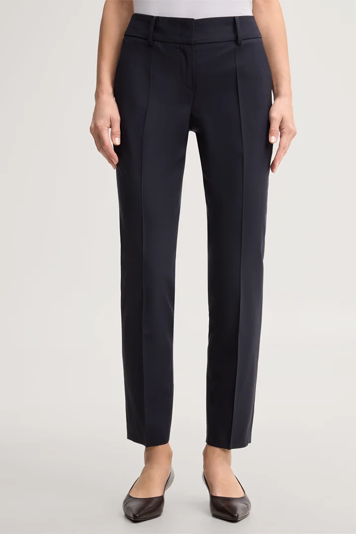 Leads to product detail page "Navy blue virgin wool stretch cigarette pants"