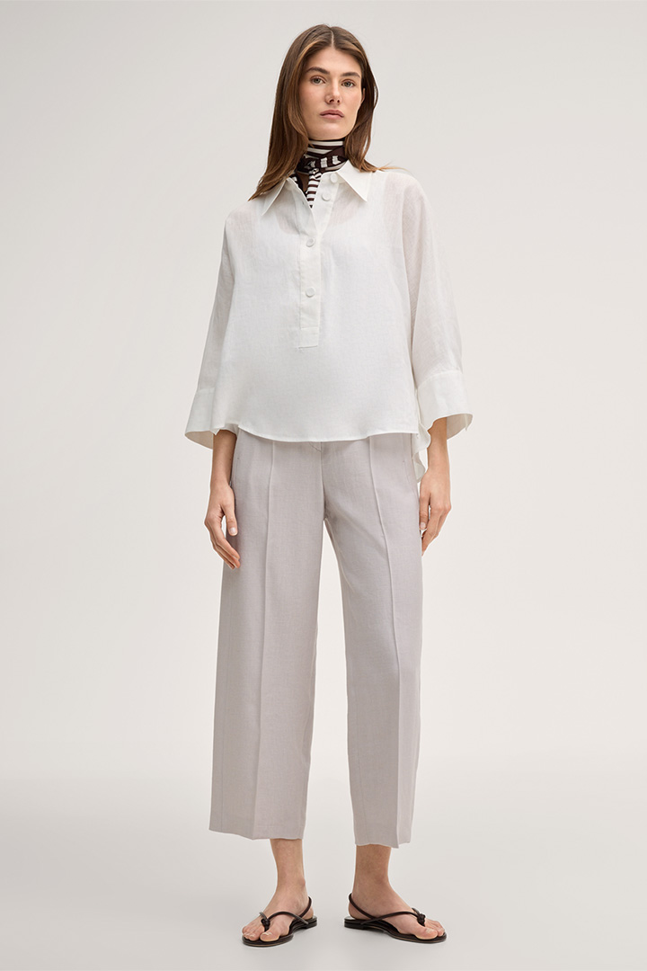 Mène à la page produit « Pantalon à pinces en lin stretch beige »