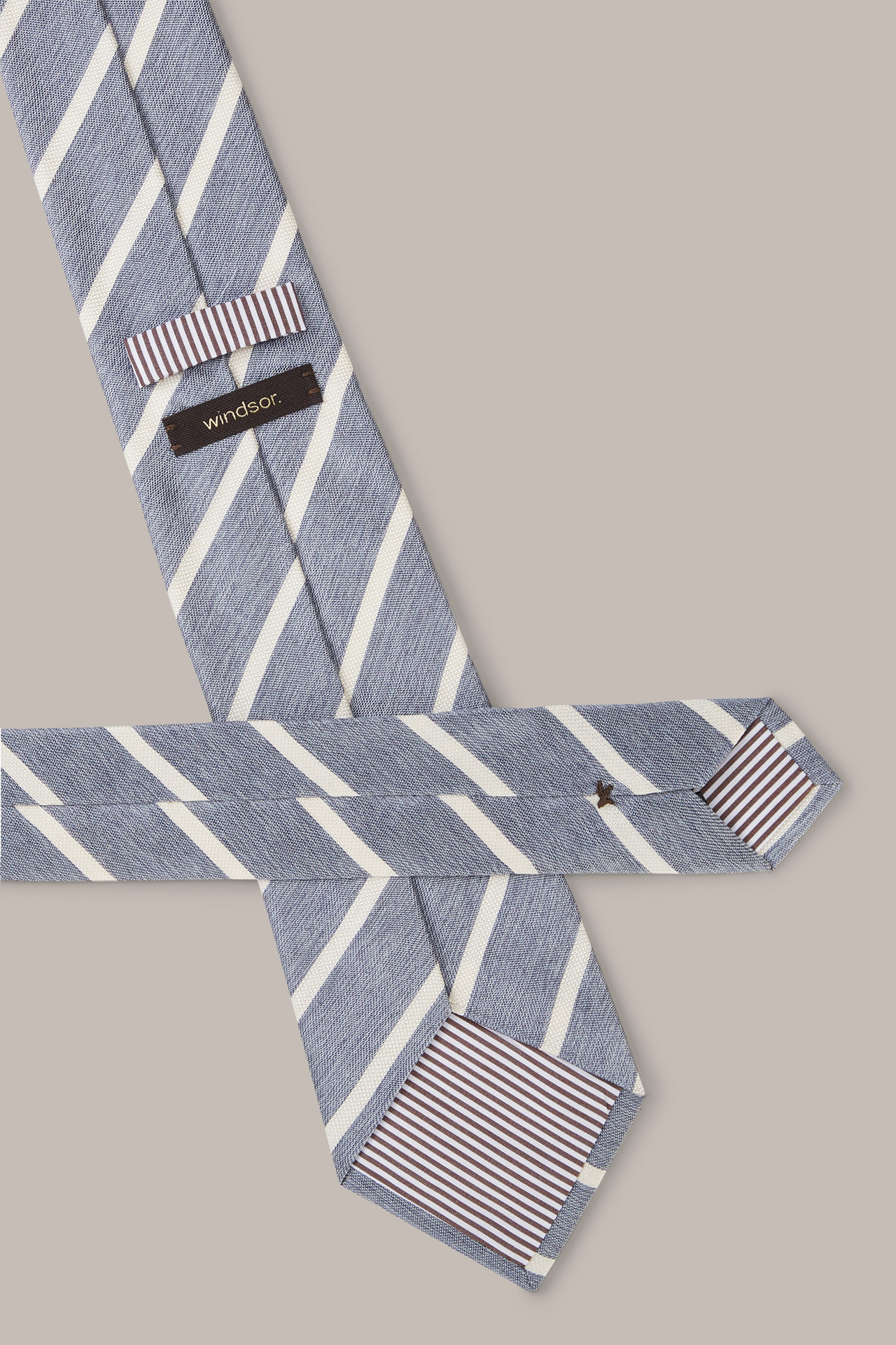 Cravate en coton et soie, en bleu et blanc à rayures