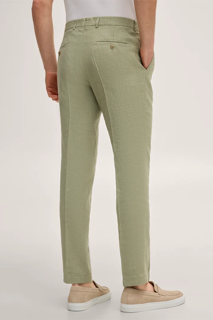 Leads to product detail page "Silvi stretch linen modular trousers with pleats in light green"
