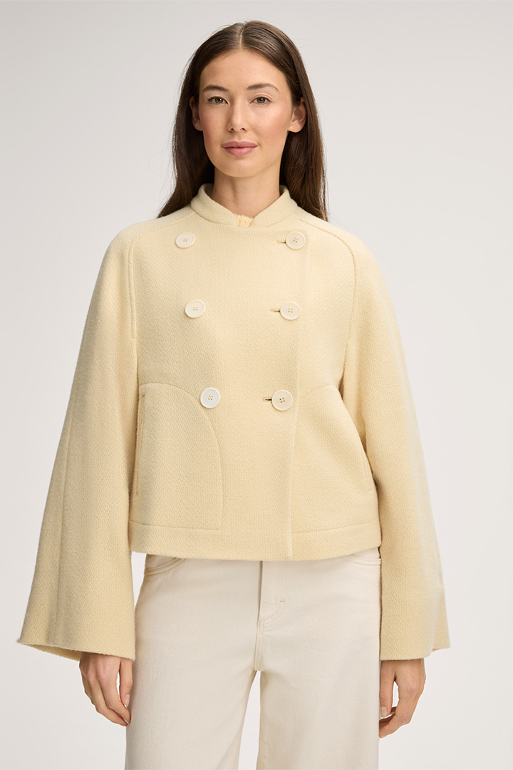 Leads to product detail page "Wool-blend Double-breasted Jacket in Vanilla"