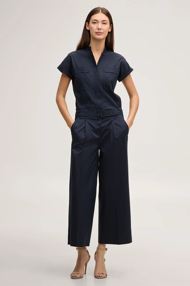 Leads to product detail page "Short-sleeved stretch cotton jumpsuit with stand-up collar in navy"