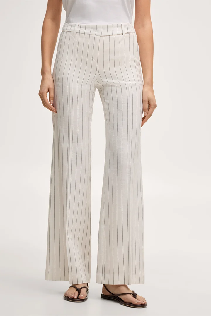 Leads to product detail page "Pinstriped linen-blend Marlene suit trousers in ecru"