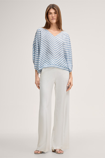 Silk poncho without sleeves in ecru and light blue stripes