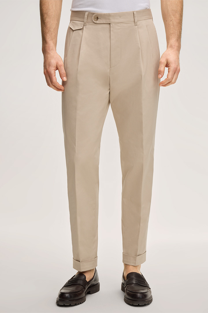 Führt zu Produktdetailseite „Baumwollmix-Baukasten-Hose Sapo mit Bundfalte in Beige"