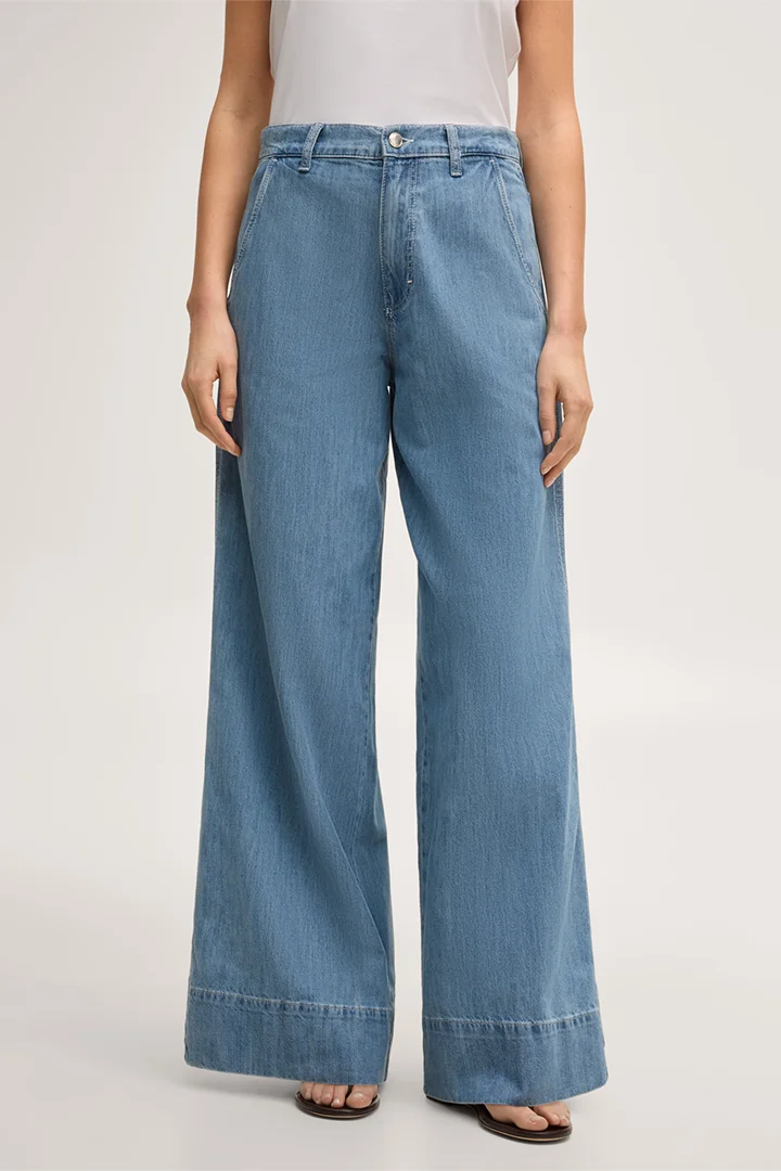 Leads to product detail page "Mid-blue washed palazzo jeans"