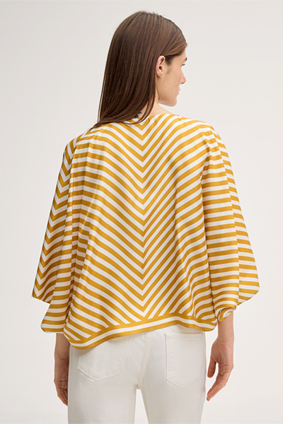 Silk poncho without sleeves in ecru yellow stripes