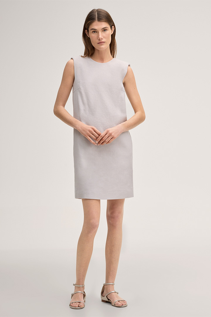 Leads to product detail page "Beige mini-length sleeveless stretch linen eggshape dress"