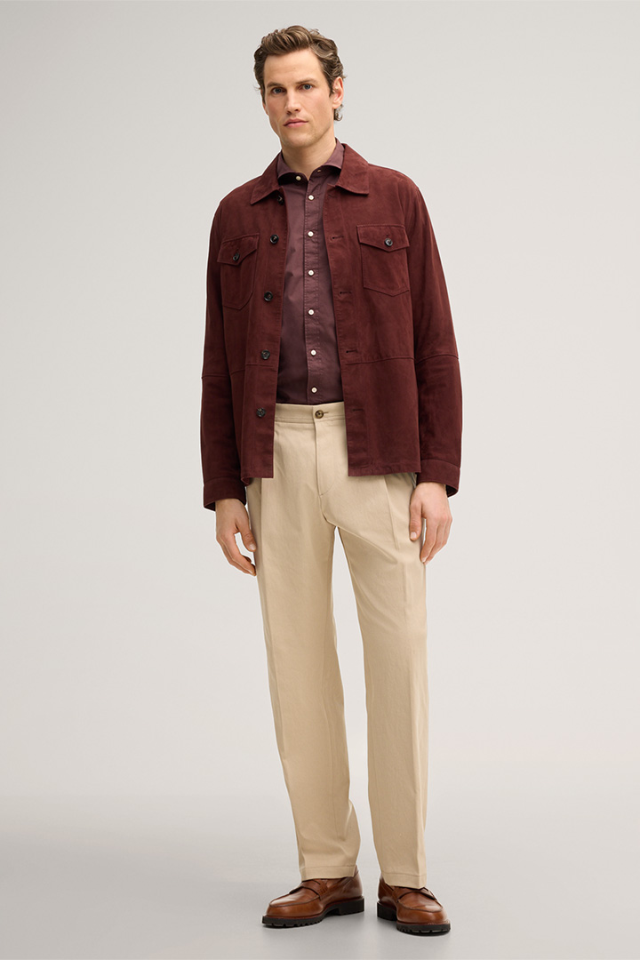 Leads to product detail page "Faso cotton blend trousers with pleats in beige"