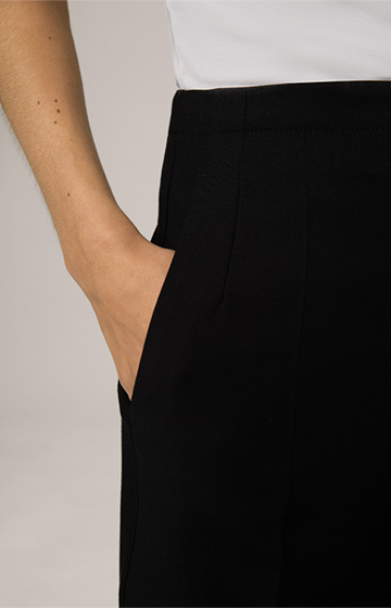 Leads to product detail page "Crêpe Marlene Trousers in Black"