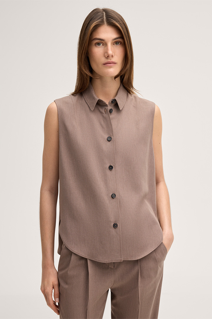 Leads to product detail page "Lyocell hem blouse top in brown"