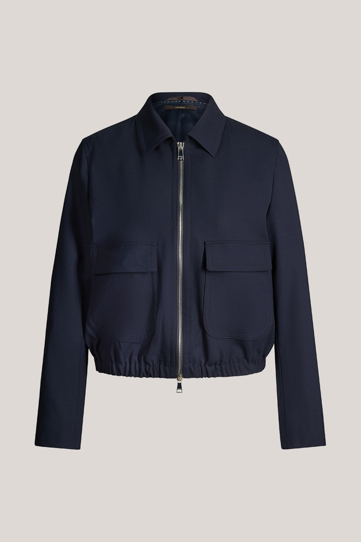 Leads to product detail page "Virgin wool stretch jacket with zip in navy"