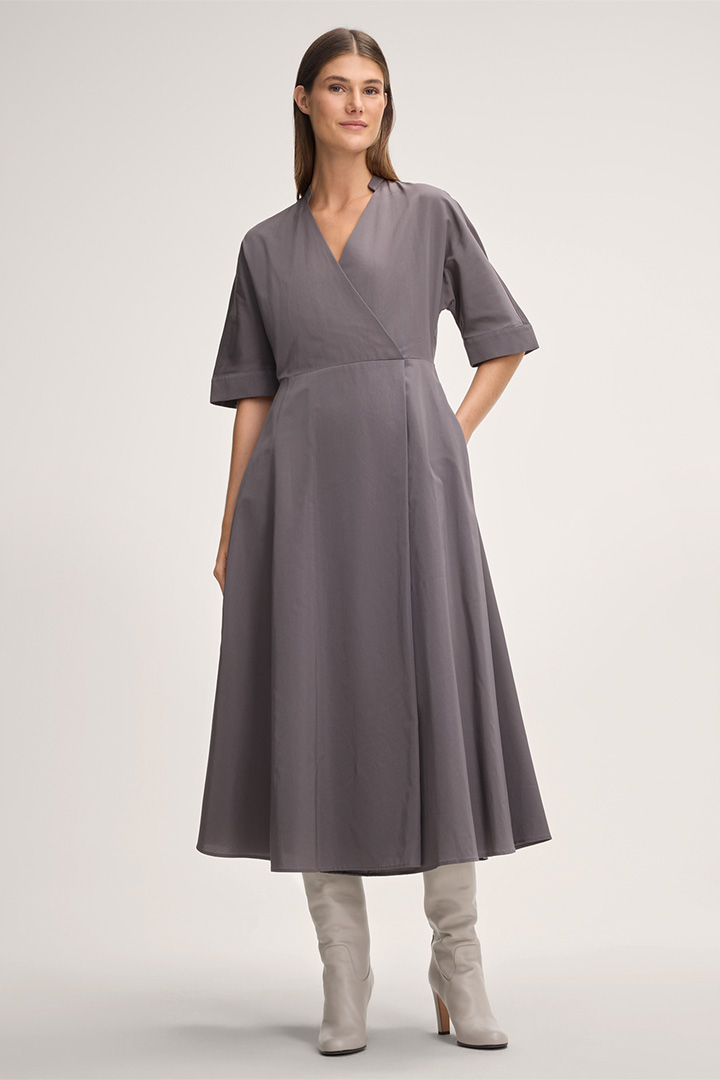 Leads to product detail page "Midi-Length Triacetate Wrap Dress in Grey"