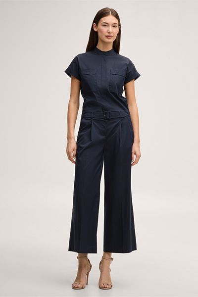 Leads to product detail page "Short-sleeved stretch cotton jumpsuit with stand-up collar in navy"