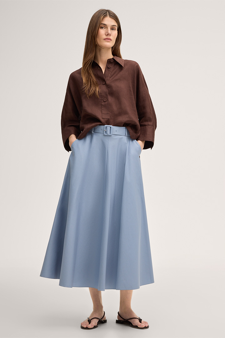 Leads to product detail page "Cotton stretch midi skirt with belt in light blue"