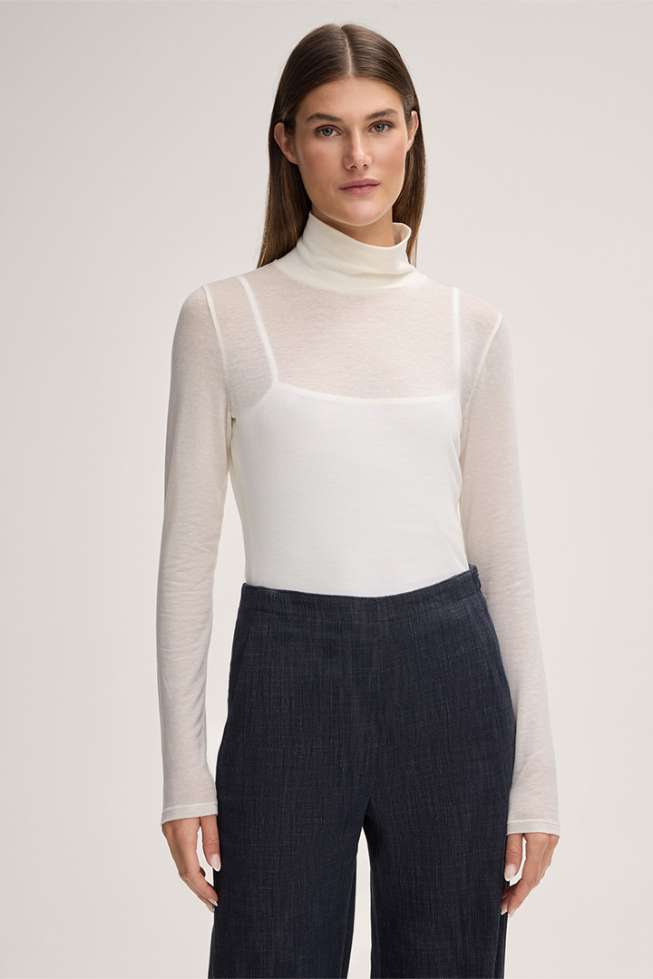Leads to product detail page "Roll Neck Shirt in Stretch Wool in Ecru"