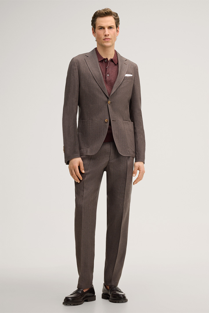 Leads to look detail page “Giro-Francos modular suit in brown”