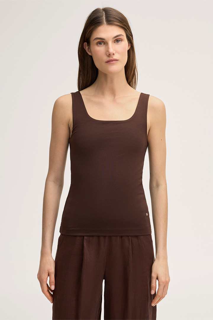 Leads to product detail page "Tencel stretch top in dark brown"