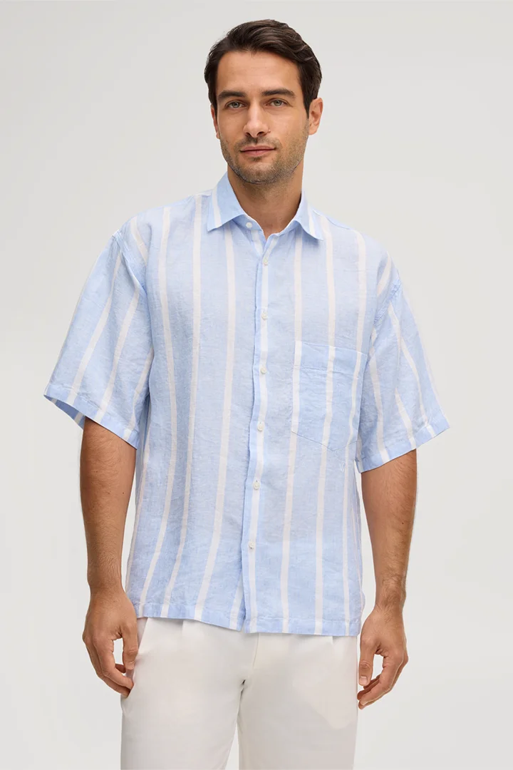 Leads to product detail page "Oberon linen shirt in blue and white stripes"